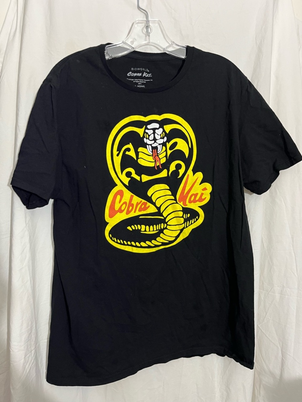Bioworld Black Cobra Kai Graphic Tee with Yellow & Red Logo